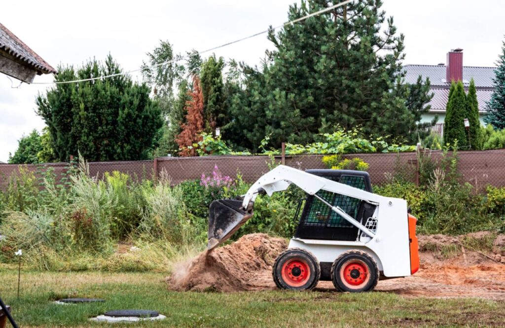 Skid Steer vs. Mini Excavator (2025 Comparison) • HEA