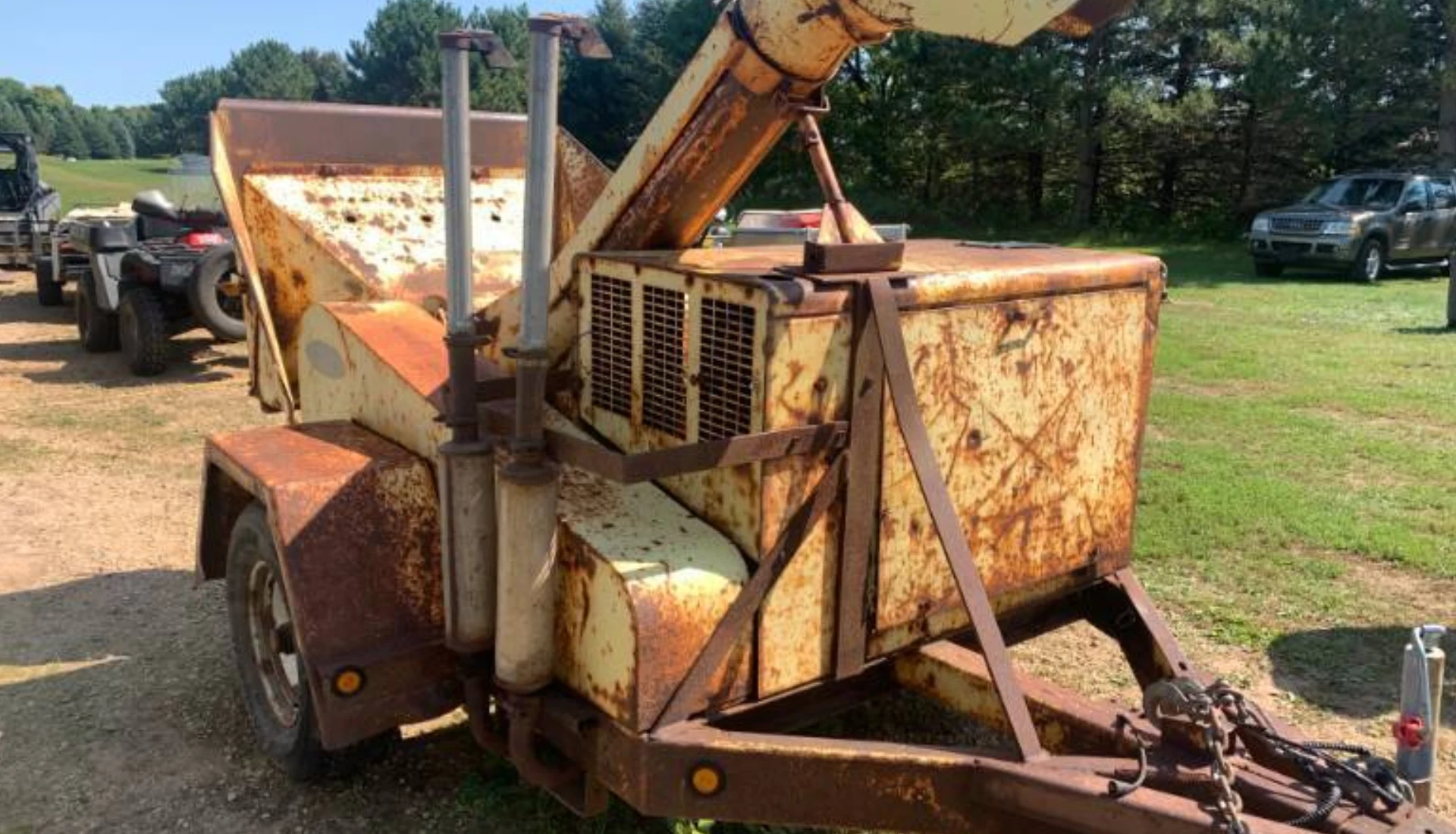 Historical Development of Kinetic Wood Chipper Technology in the USA